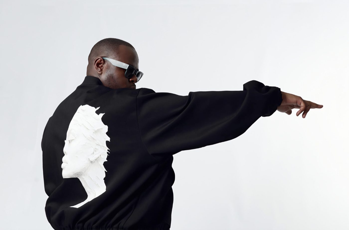 Official October 2026 publicity photograph of South African producer, vocalist and DJ MPHO.WAV
